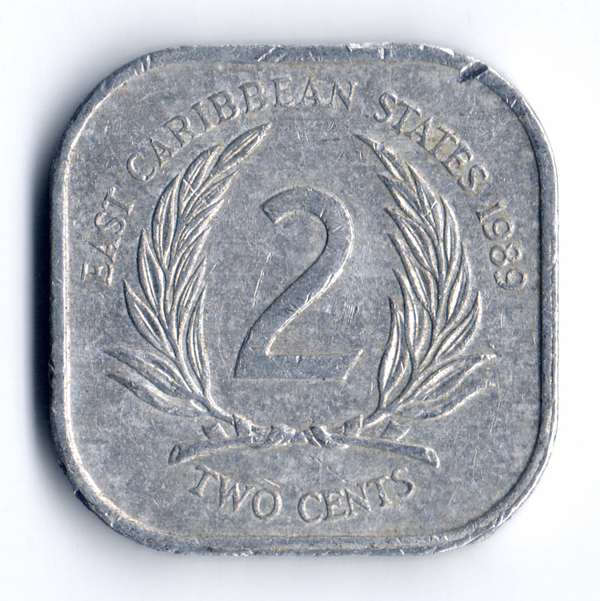 Шт 02. East Caribbean Dollar монета 1989. 2 Цента 1987 Восточно-Карибского государства. Монета East Caribbean States 2 цента 2002 года. 2 Шт.